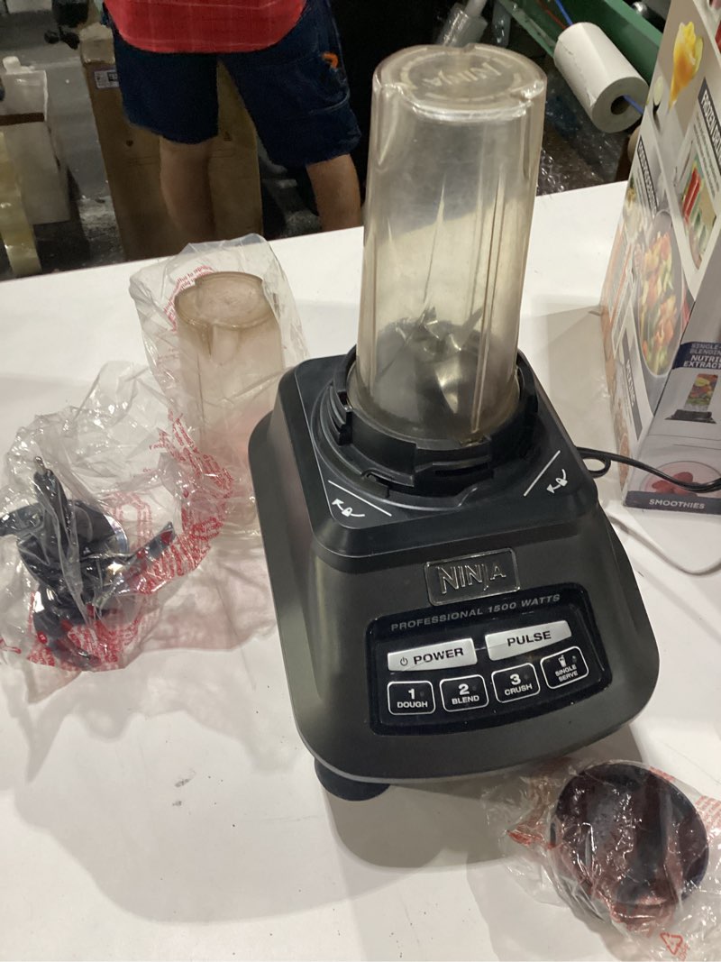 Condition photo showing As Is for incomplete damaged ninja kitchen system | all-in-one food processor & blender for smoothies | includes pitcher, (2) 16 oz. to-go cups & 8-cup bowl | makes salsa, dough, shakes, & frozen drinks | 1500w | black | bl770 (2) 16-oz. cups