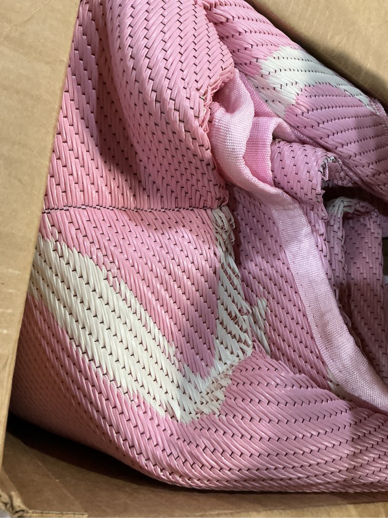 Condition photo showing As Is for nuanchu outdoor rug 5x8 ft reversible bow plastic straw rugs, light pink and beige coquette camping carpet patio mat indoor outdoor rv mat for valentine's day outside beach pool patio backyard deck light pink,beige 5 x 8 ft
