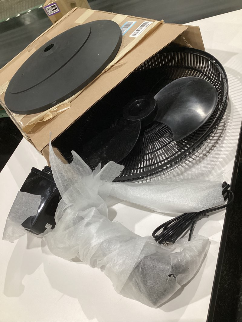 Condition photo showing item condition for (used, not tested) lasko oscillating pedestal fan, thermostat, adjustable height, remote control, timer, 4 speeds, for bedroom, living room, office & dorm, 16\", black, s16612 black 16612 fan