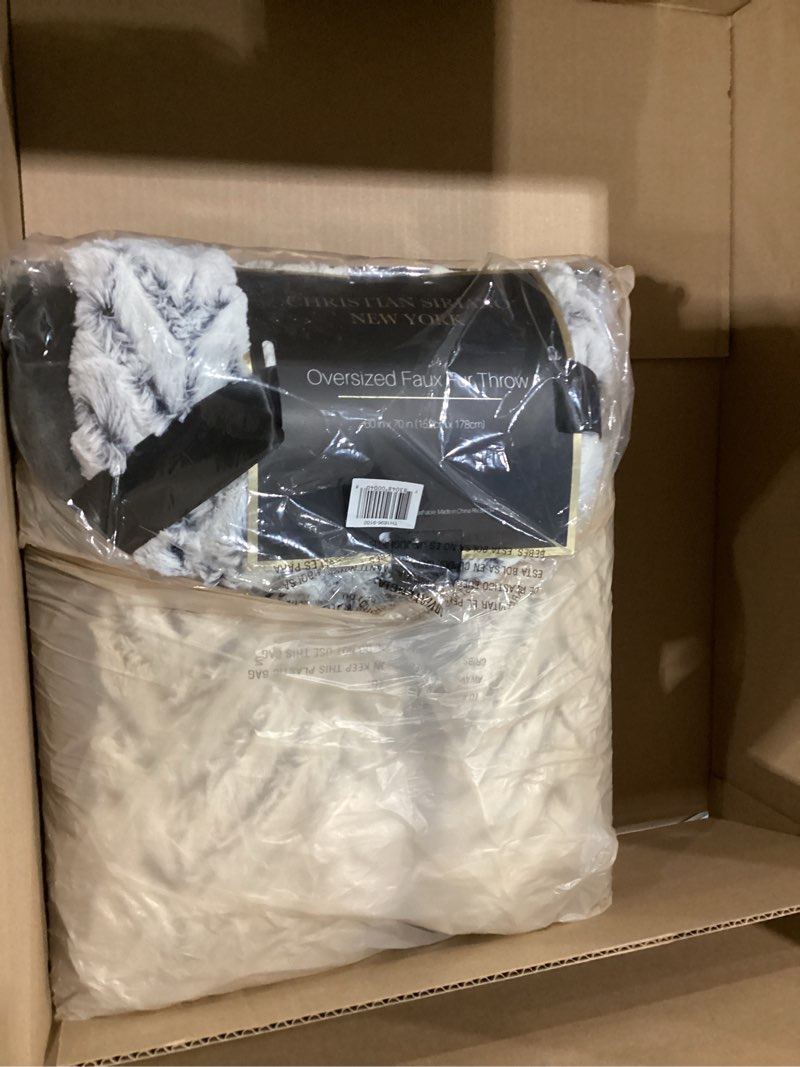 Condition photo showing New/Like New for Christian Siriano NY® Grey Chevron Throw in Gift Box, Grey Polyester, 1-Piece Giftable Throw Blanket, Geometric Themed, OEKO-TEX Certified Confidence