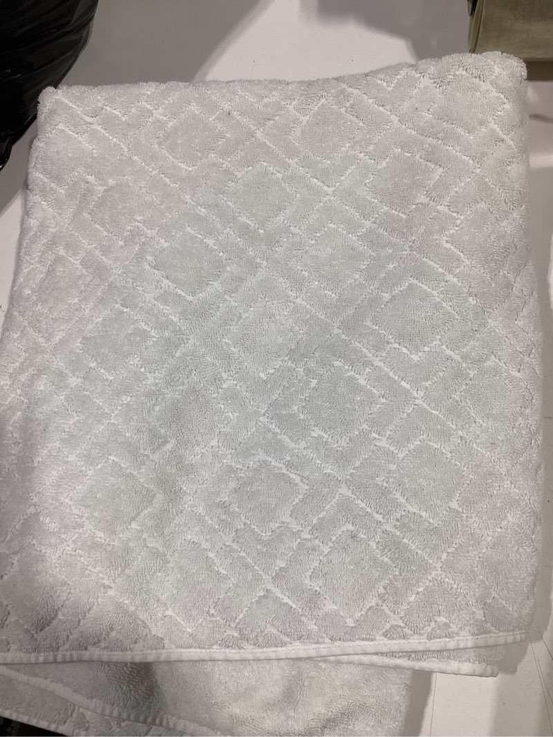 Condition photo showing As Is for white bath towel 5.5 lbs.-premium