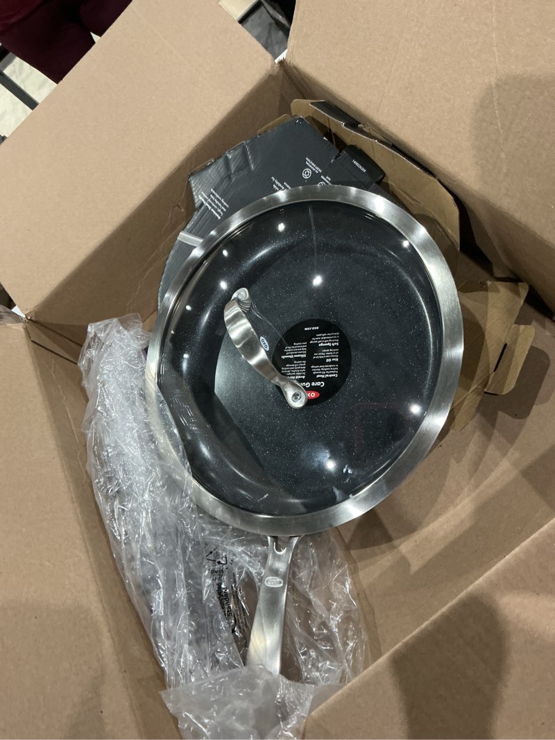 Condition photo showing New/Like New for oxo enhanced 12” nonstick frying pan skillet with lid, ceramic pfas-free cookware, durable hard anodized, scratch resistant, stainless steel handle, eggs & omelets, dishwasher & oven safe, black black 12" frying pan with lid