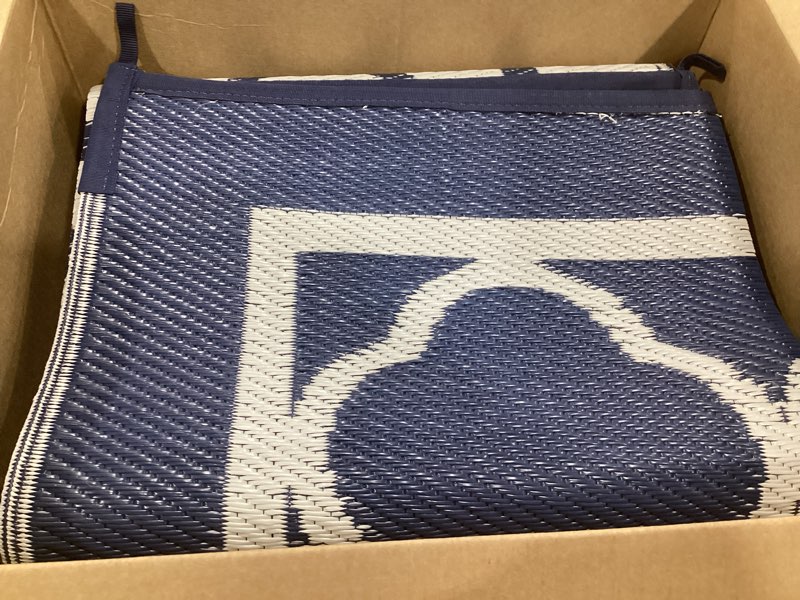 Condition photo showing As Is for genimo 5' x 8' outdoor rug waterproof for patio decor, foldable reversible plastic straw area rugs mat for camper, outside carpet for rv, deck, porch, picnic, beach, balcony, blue & white navy blue & white 5' x 8' (rectangular)