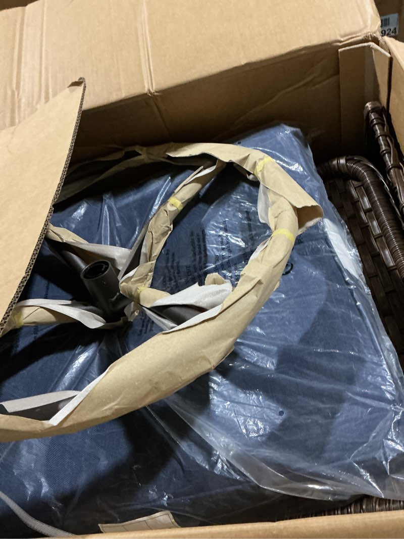 Condition photo showing Good Condition for plaincurve metal and brown wicker outdoor rocking chair patio swivel chairs with olefin navy blue cushions