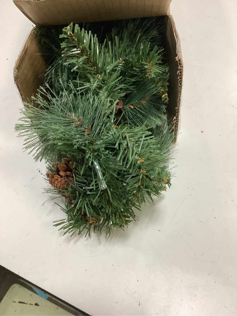 Condition photo showing Good Condition for 6' green flowering pine needle & pvc mixed tips garland with 35 battery box leds