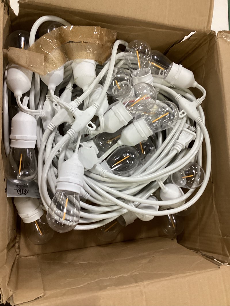 Condition photo showing As Is for sunthin outdoor string lights, 48ft commercial grade string light with 15 11w dimmable edison vintage bulbs, hanging for outside, patio, garden, backyard, porch, deck, pergola, party white 48ft