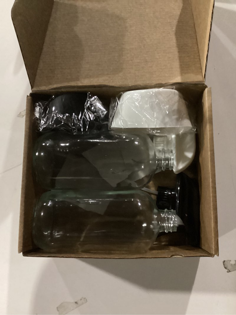 Condition photo showing As Is for Glass Spray Bottles for Cleaning Solutions, 16oz Reusable Clear Empty Mist Spray Bottle with Silicone Sleeve for Hair, Plants and Essential oils 2 Pack