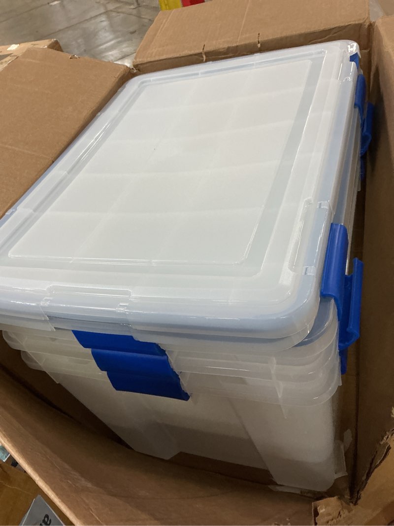 Condition photo showing As Is for iris usa weatherpro 74 qt storage bins with lids, 3 pack, bpa-free plastic gasket box with tight latch and seal, stackable nestable tote tub - clear/blue 74 qt. - 3 pack