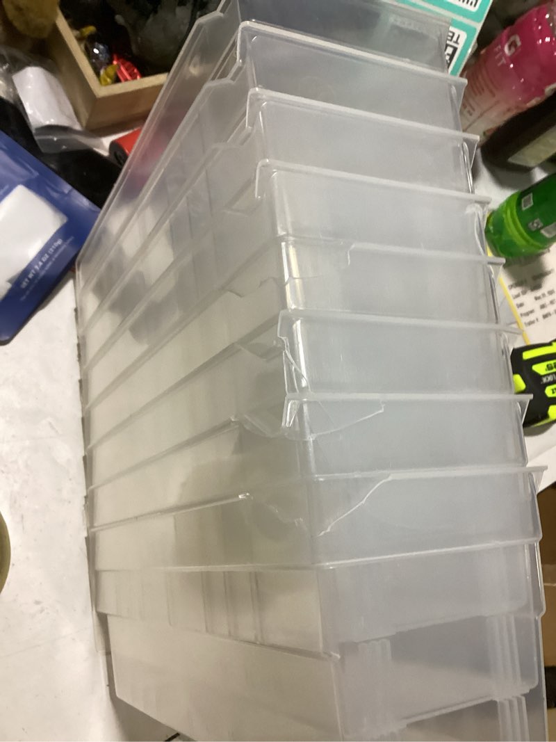 Condition photo showing As Is for **5 cracked (on backside)**akro-mils 30120 plastic shelf bins, heavy duty storage bins for garage, closet, and drawer organization, 12\\\\\\\" x 4\\\\\\\" x 4\\\\\\\", clear, 24-pack
