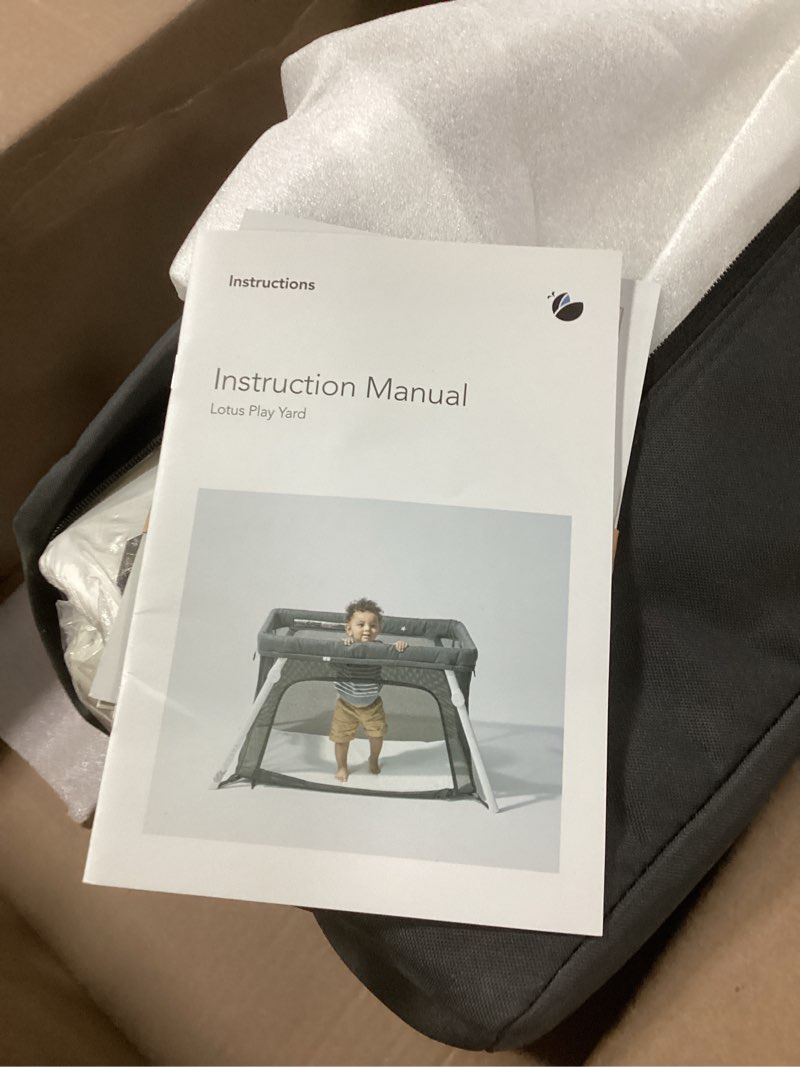 guava family lotus travel crib & play yard