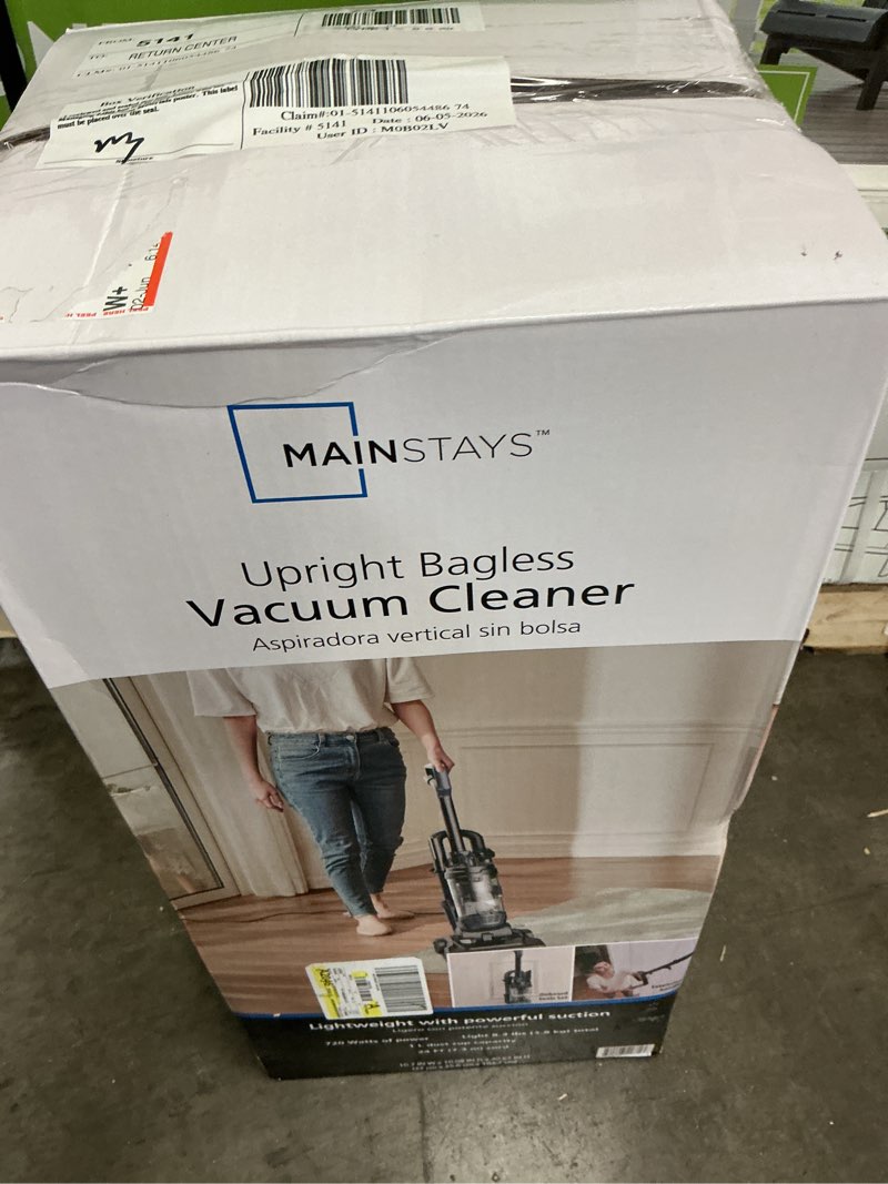 Condition photo showing As Is for mainstays lightweight bagless upright vacuum cleaner with brush and crevice tool