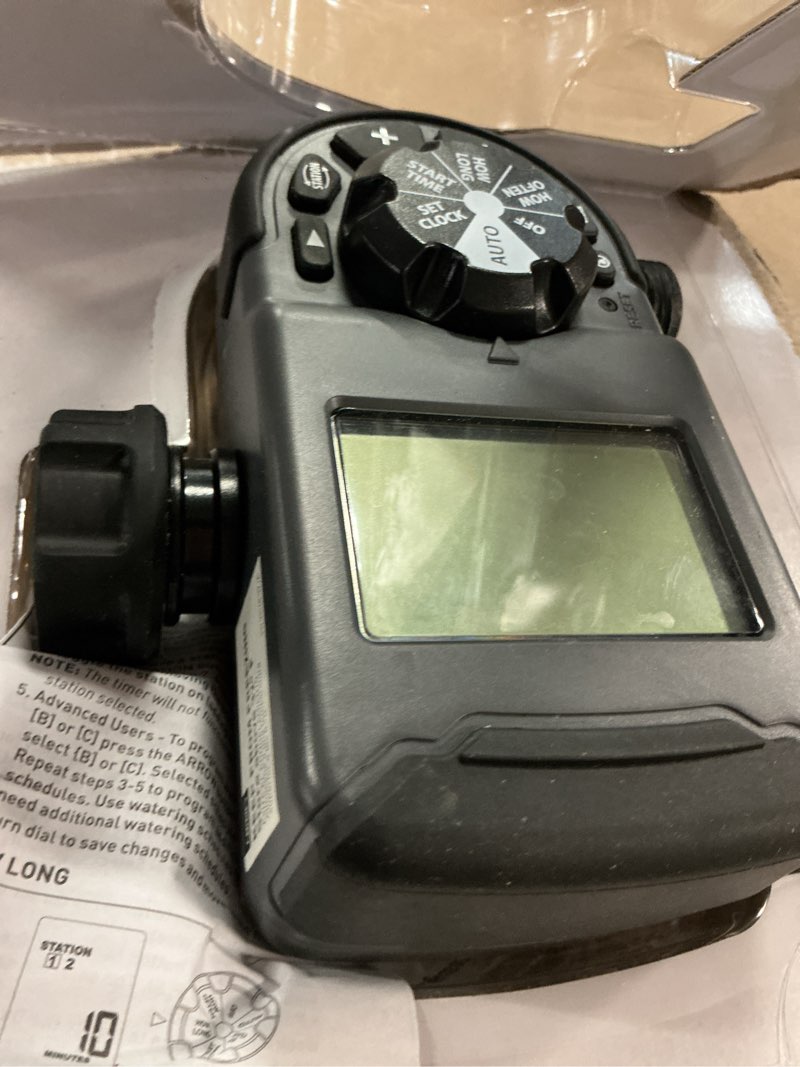Condition photo showing As Is for 2-outlet hose faucet timer