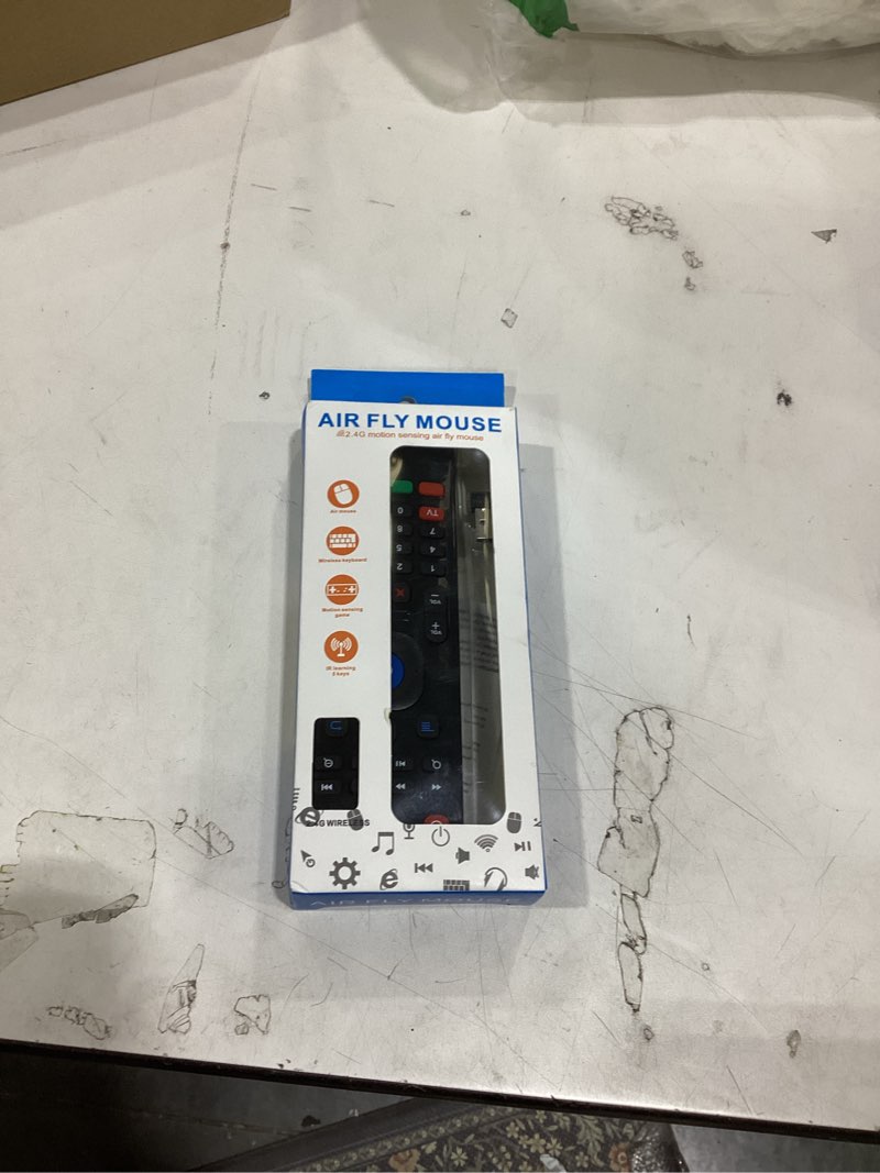 Condition photo showing Good Condition for this item is an mx3 2.4g air fly mouse, which functions as a multifunctional remote control, wireless keyboard, and motion-sensing game controller.  