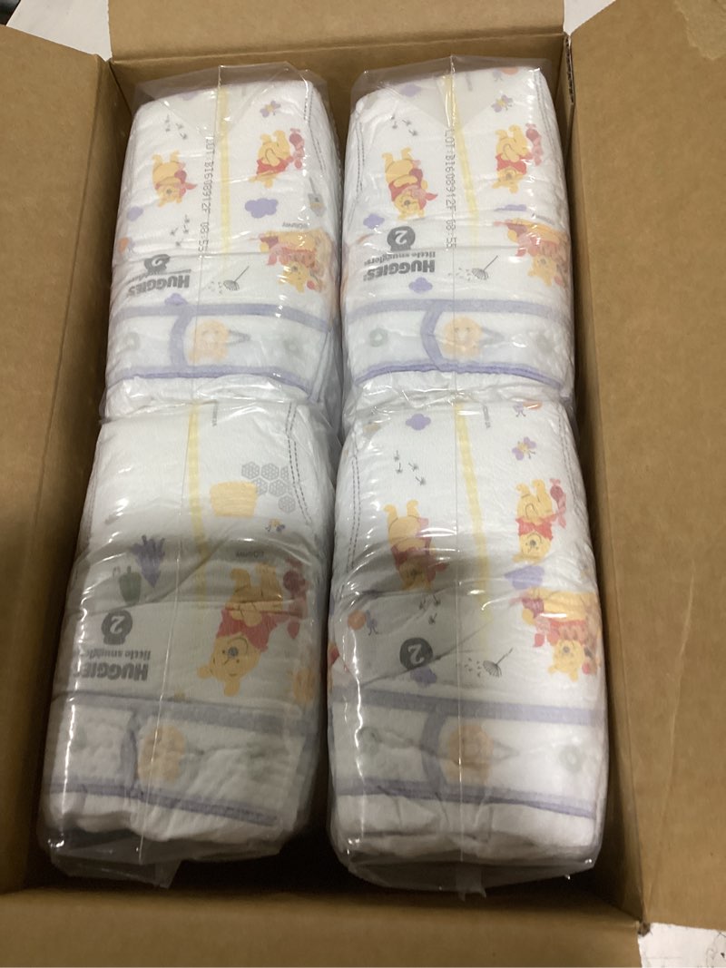 Condition photo showing Good Condition for huggies size 2 diapers, little snugglers baby diapers, size 2 (12-18 lbs), 84 count, packaging may v