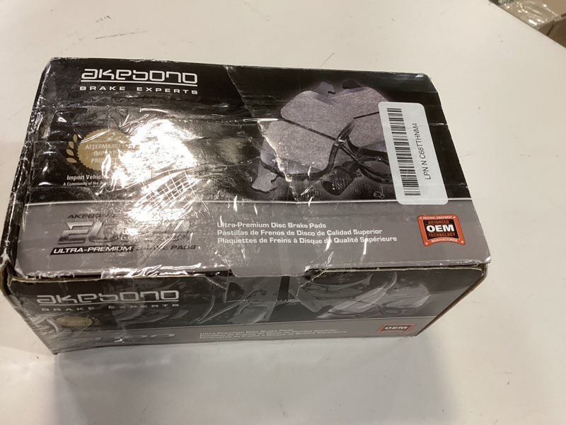 Condition photo showing As Is for akebono eur1850b disc brake pad set for 19-20 bmw x5 x6 x7