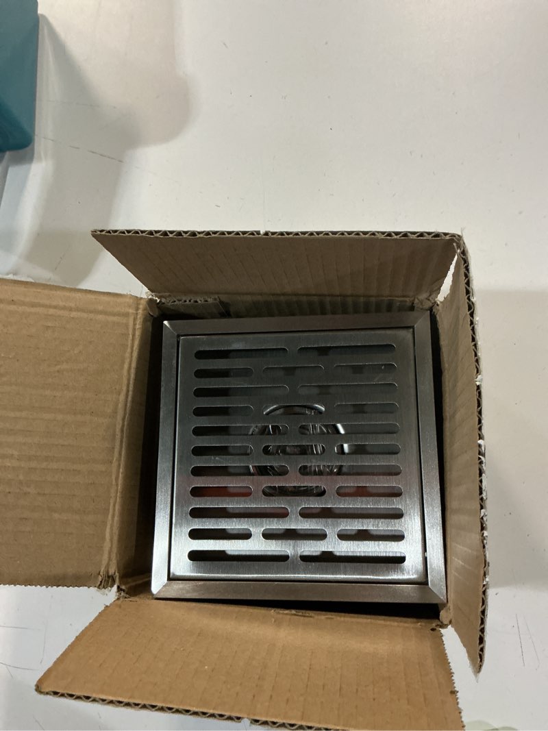 Condition photo showing As Is for 6-inch square shower drain, sus304 stainless steel floor drain with flange kit, seamless welding geometric design for bathroom, bathtub, and shower stall installation a 6-inch