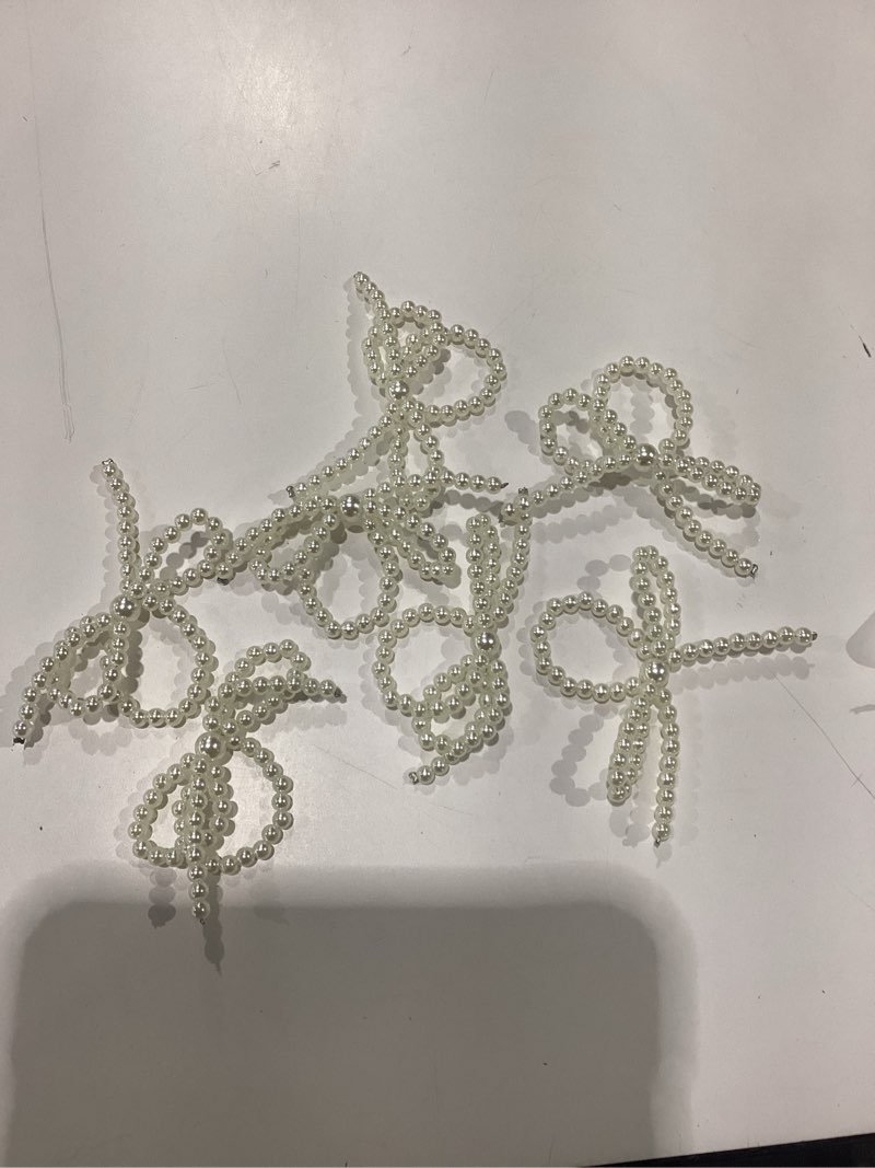 Condition photo showing New/Like New for 12 pcs pearl bow napkin rings imitation bow pearl ring napkin holder delicate beaded serviette buckles for christmas wedding party dinner table decor and daily use (classic)