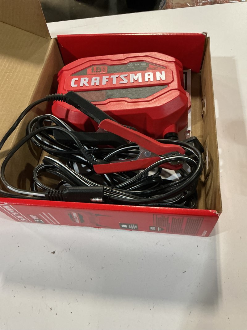 Condition photo showing As Is for craftsman 3-in-1 fully automatic automotive battery charger, maintainer, and desulfator, cmxcesm259, 1.5 amps, 6 volt & 12 volt, for power sport, motorcycle, car, and boat batteries