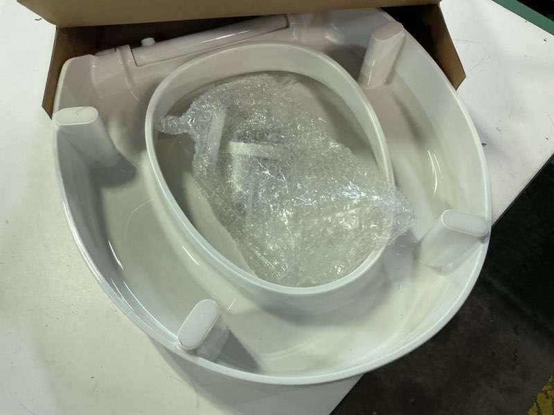 Condition photo showing Good Condition for 25876-0 hyten elevated quiet-close round toilet seat, contoured seat with grip-t
