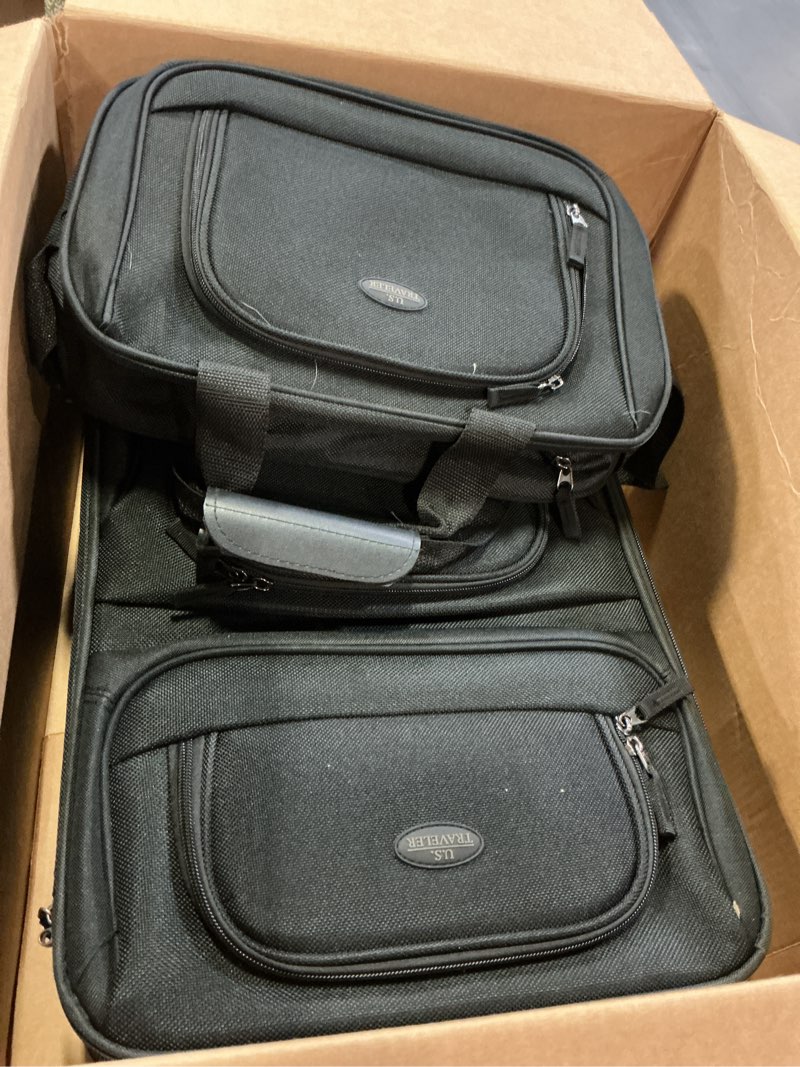 Condition photo showing As Is for u.s. traveler rio lightweight softside rolling carry-on suitcase, 2-wheel set, black black 2-wheel set (21"/14")