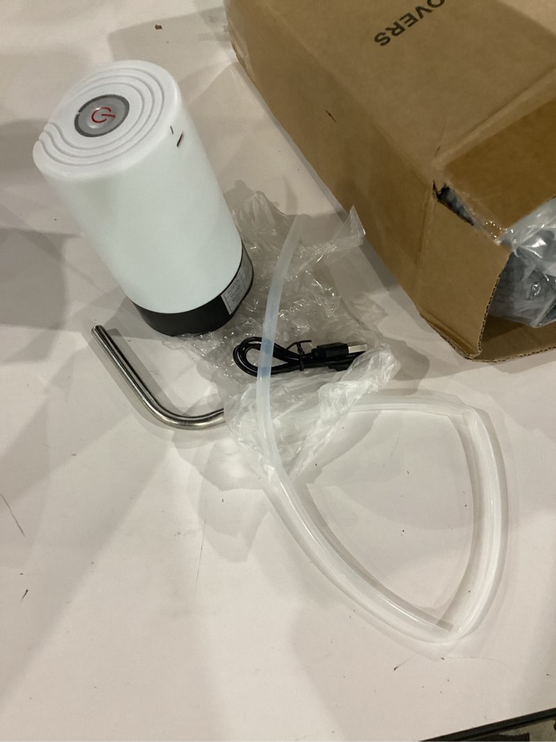 Condition photo showing As Is for water table pump, portability electric water pump with usb data cable,white automatic drinking water bottle pump for travel, kitchen, home, office