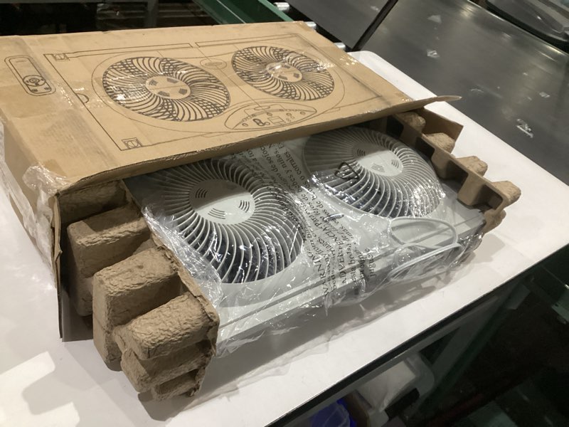 Condition photo showing New/Like New for bionaire window fan with reversible airflow blades – 3-speed settings, programmable thermostat, led display, remote control, fits 24–36" windows, no assembly required white 2 blades electronic control with lcd screen window fan