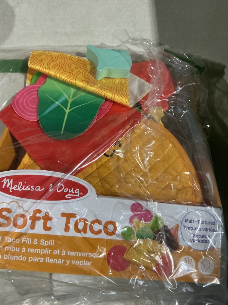 Condition photo showing As Is for Melissa & Doug Multi-Sensory Soft Taco Fill & Spill Infant Toy - Sensory Toys For Babies, Baby Taco Toy, Baby Toys For Ages 6 Months And Older