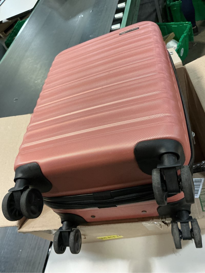 Condition photo showing As Is for Amazon Basics 21" Hardside Carry-On Luggage, Hardshell Suitcase With Wheels, Expandable For Up to 25% More Space, With Scratch-Resistant Surface, Four Multi-directional Wheels, Rose Gold Rose Gold Carry-On