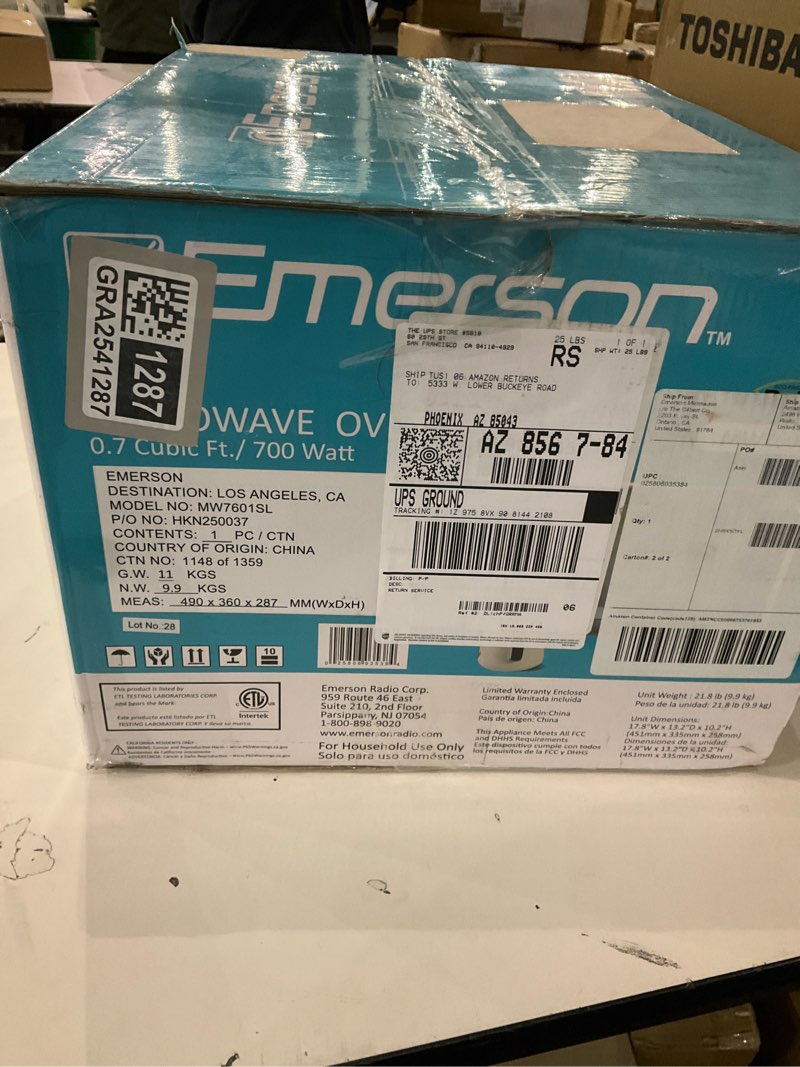 Condition photo showing As Is for Emerson MW7601SL Countertop Microwave Oven with Sleek Mirrored Finish Glass Door, 700W, 10 Power Levels and 6 Pre-Programmed Settings with Child Safe Lock, 0.7. Cu. Ft., Silver 0.7 Cu. Ft.