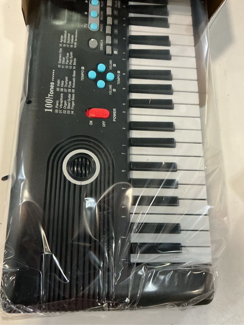 Condition photo showing Good Condition for 61 key keyboard piano, portable electronic digital piano, built in dual speakers, external microphone, power plug, rich teaching content, multi-functional electronic piano suitable for beginners