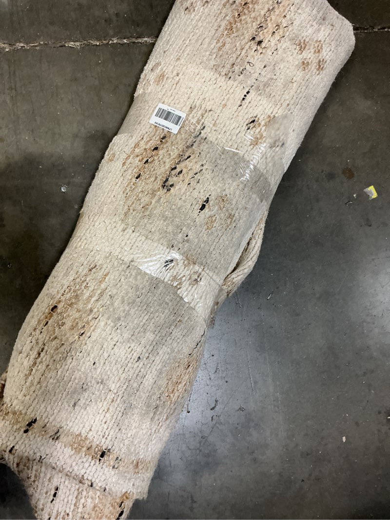 Condition photo showing As Is for Loloi Angela Rose Rivers Collection RIV-04 Natural / Ivory 5'-0" x 7'-6" Reversible Area Rug