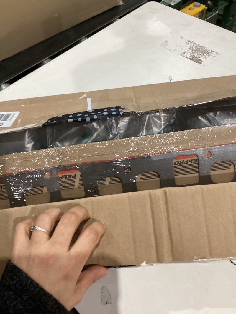 Condition photo showing As Is for FEL-PRO MS 93094 Intake and Exhaust Manifolds Combination Gasket for Jeep Grand Cherokee