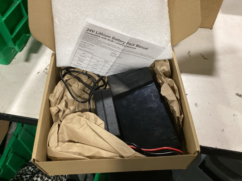 Condition photo showing As Is for 24v 5ah lithium battery with led battery indicator, 24v rechargeable battery with 29.4v 2a charger, cable connector for diy projects, boombox, kids ride on cars 24v 5000mah