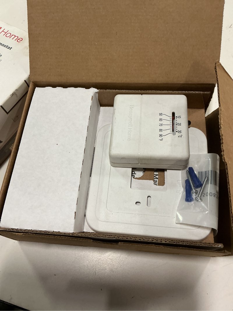 Condition photo showing As Is for Honeywell CT30A1005 Standard Manual Economy Thermostat, Almond, 0.6