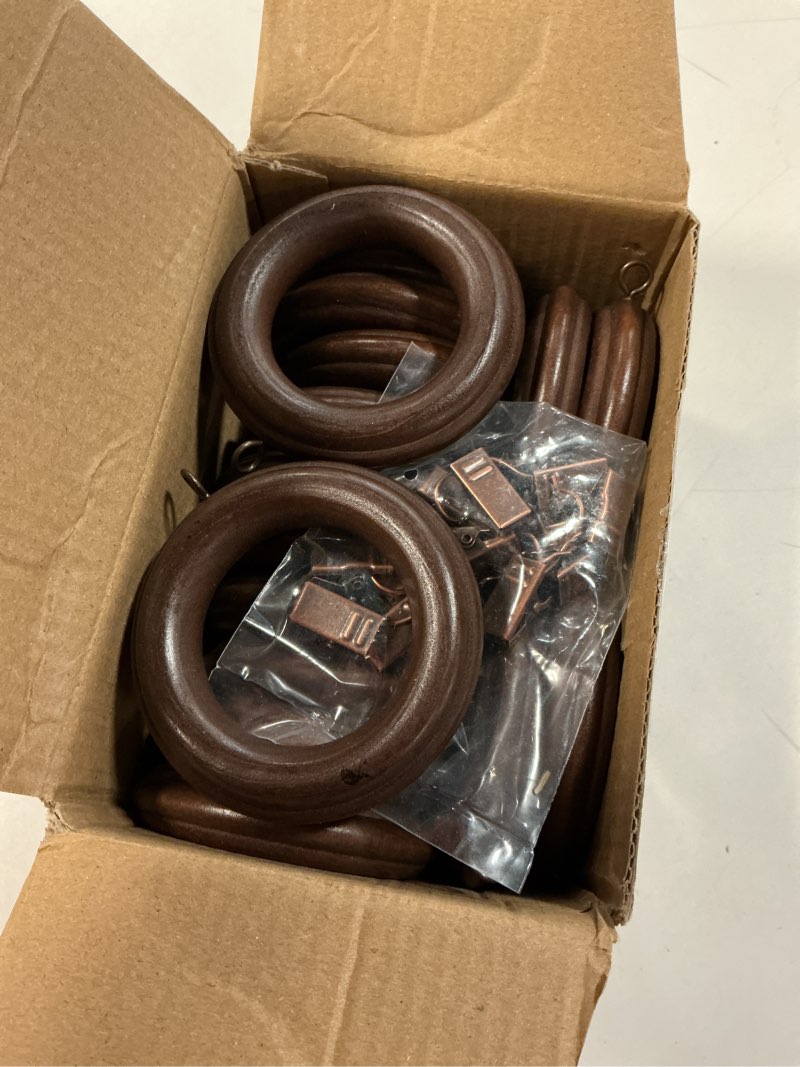Condition photo showing Good Condition for 16 Pack Curtain Rod Rings Wooden with Drapery Clips 2.95 Inch Outer Diameter Beech Wood Carved Drapes Rings 1.7 Inch Interior Diameter for 1-1.5 Inch Curtain Rod Pole (Black)