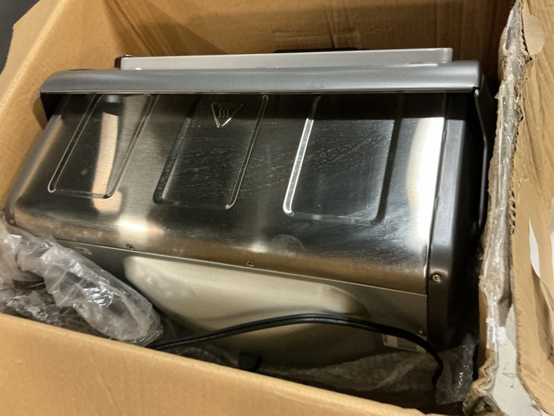 Condition photo showing As Is for Hamilton Beach Air Fryer Toaster Oven Combo with Large Capacity, Fits 6 Slices or 12” Pizza, 4 Cooking Functions for Convection, Bake, Broil, Roll-Top Door, Easy Reach Sure-Crisp, Stainless Steel