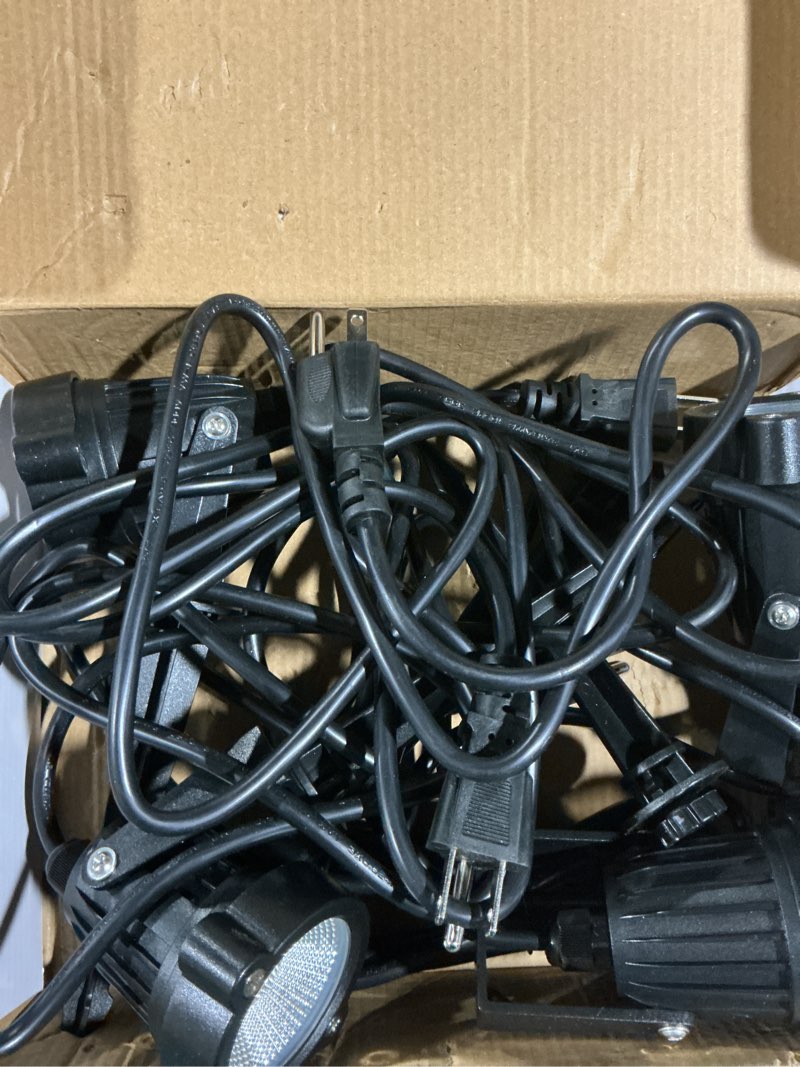 Condition photo showing As Is for Svater Landscape Lighting Low Voltage,4 Pack Outdoor Spotlights with Transformer, Plug in LED Spot Lights for Yard, Backyard,House 12V 3000K Warm White, IP65 Waterproof