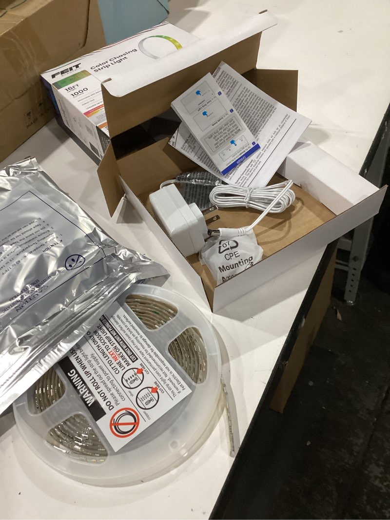 Condition photo showing Good Condition for Feit Electric Smart Light Strip 16FT, Ultrathin RGBW Color Chasing LED Light Strip, 2.4GHz Wi-Fi Enabled, Works with Alexa and Google Home Assistant, Remote Control, (0.4in x 192in) TAPE192/CHASE/AG Chasing Strip Light Thin Strip 10FT x 1.8in Thin Strip