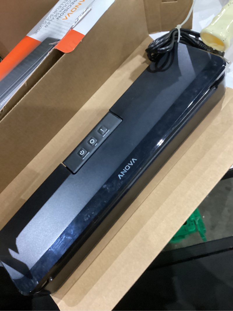 Condition photo showing As Is for anova culinary vacuum sealer, slim & compact, includes 10 pre-cut bags (bpa-free), wet & dry dual food vacuum sealer machine for sous vide and long-term storage, 2-year warranty