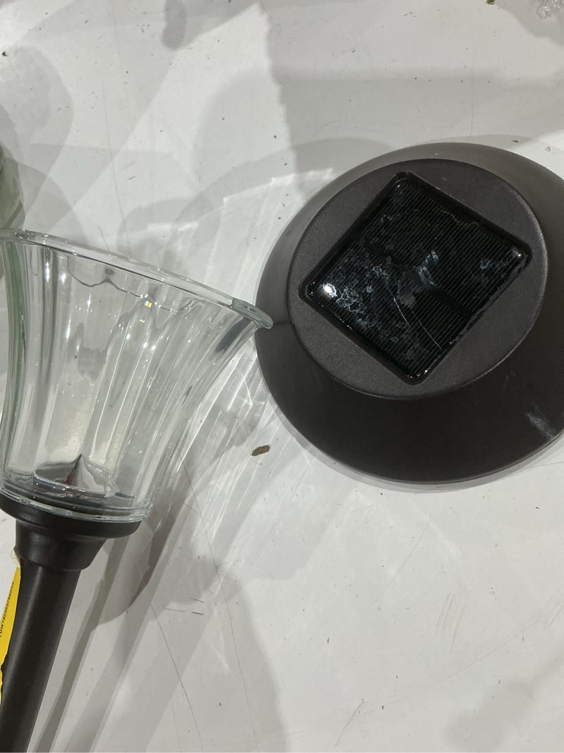 Condition photo showing As Is for harbor breeze 15 -lumens oil-rubbed bronze solar led outdoor path light with dusk-to-dawn sensor