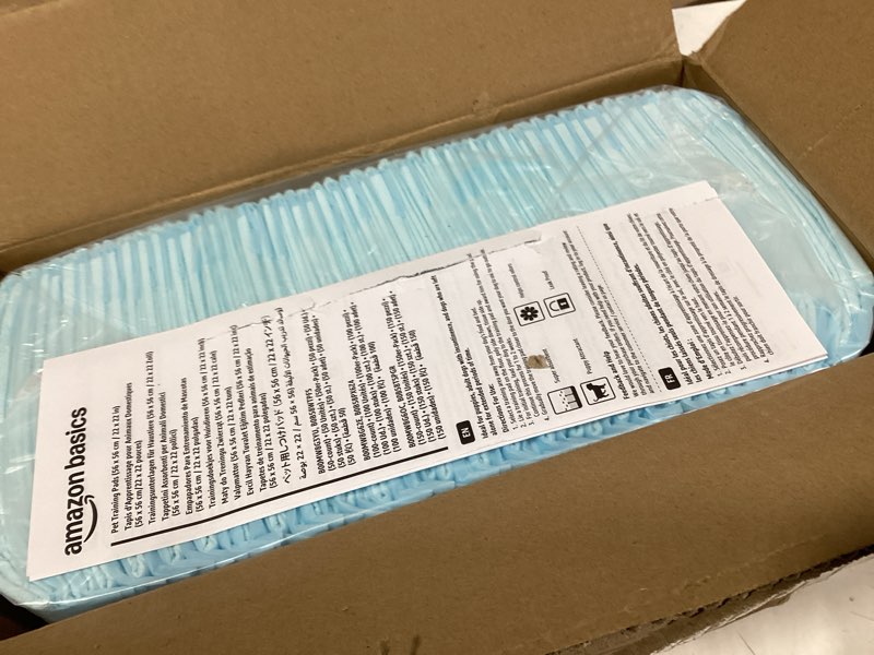 Condition photo showing New/Like New for Amazon Basics Dog and Puppy Pee Pads, 5-Layer Leak-Proof Super Absorbent, Quick-Dry Surface, Potty Training, Regular (22x22"), 100 Count, Blue & White Regular (100 Count)