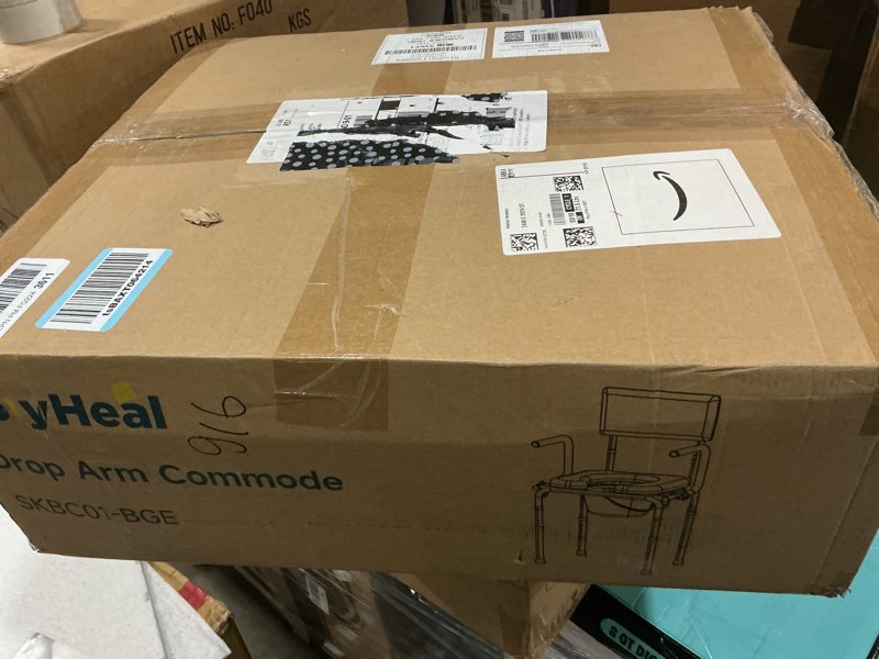 Condition photo showing New/Like New for drop arm bedside commode, commode toilet with padded seat and backrest, 400lbs capacity, 6.3qt removable bucket and splash guard, adjustable height portable toilet for adults, beige