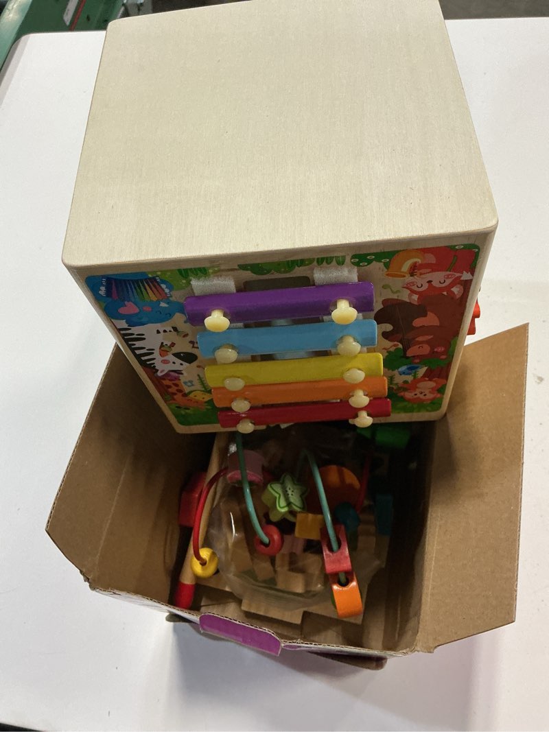 Condition photo showing New/Like New for kmtjt wooden activity cube toddler toys 12-18 months, 7-in-1 montessori learning toys for 1 2 year old boys girls, bead maze sensory toy, first 1st birthday gifts with sorting & stacking board (pink) pink packaging
