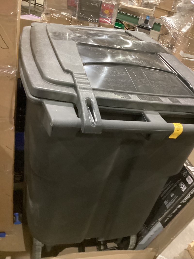 Condition photo showing As Is for toter 96 gallon black plastic wheeled indoor/outdoor hinged lid trash can