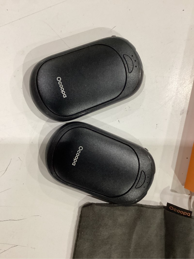Condition photo showing New/Like New for OCOOPA Magnetic Hand Warmers Rechargeable 2 Pack, UL Safety Heat 100-126°F, 3-Settings, Pocket-Sized, Max. 8 Hrs Long Lasting,Great for Raynauds, Golf, Hunting, Camping, Gifts for Men Women, UT3 Lite Black