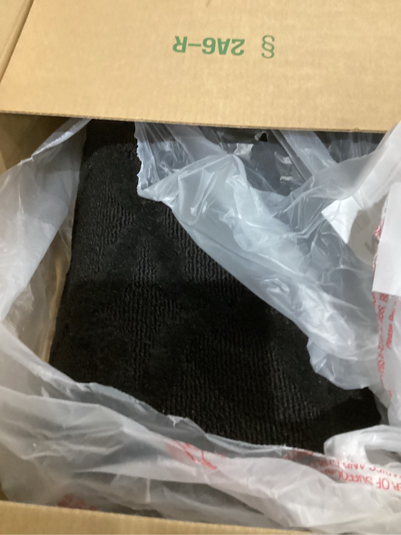 Condition photo showing As Is for Garland Rug Sparta Non Slip Polypropylene 4 Ft. X 6 Ft. Black Area Rug- Ideal for Living Rooms & Hallways, Stylish & Durable for High-Traffic Areas Black 4' x 6' (Rectangular)