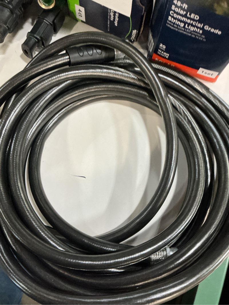 Condition photo showing As Is for neverkink teknor apex 5/8-in x 25-ft heavy-duty kink free vinyl gray coiled hose