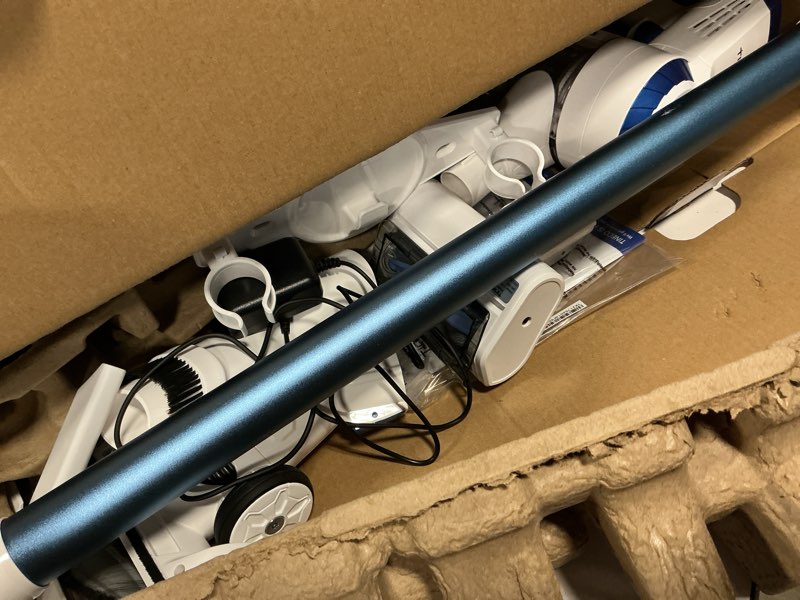 Condition photo showing As Is for t1 cordless stick vacuum, lightweight 300w motor, hepa filter, led headlight, multi-surface clean