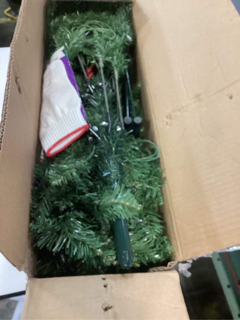 Condition photo showing As Is for 6 FT Pre-lit Christmas Tree, Artificial Spruce Christmas Tree 600 PVC Branch Tips 250 Warm White LED Lights, Easy Assembly with Metal Stand and Hinged Branches Decoration