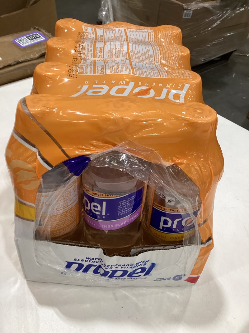 Condition photo showing Good Condition for Propel, 3 Flavor Variety Pack, Zero Calorie Sports Drinking Water with Electrolytes and Vitamins C&E, 16.9 Fl Oz (Pack of 12) Grape / Berry / Kiwi Strawberry 16.9 Fl Oz (Pack of 12)